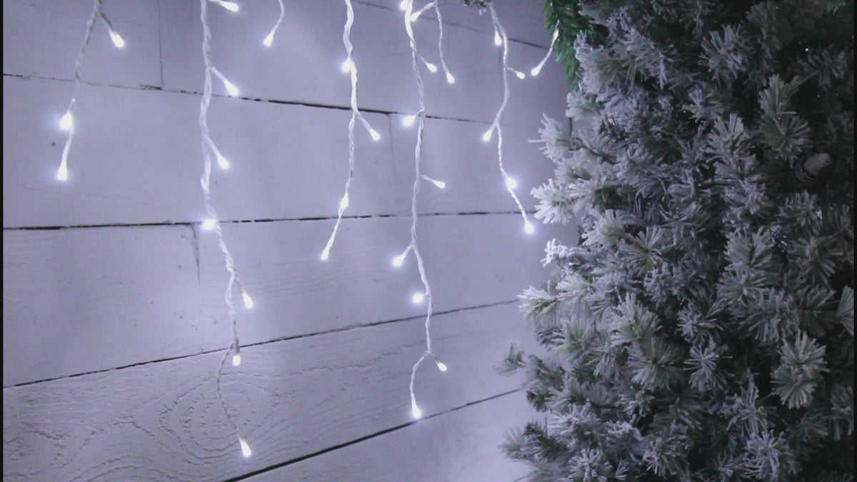 Load video: Snowing Icicle Lights - White
